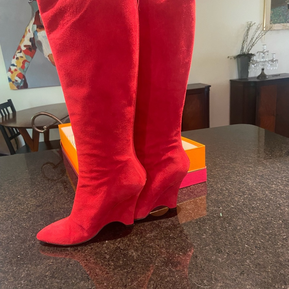 Knee high red suede kitten heeled boots.  Kate Spade